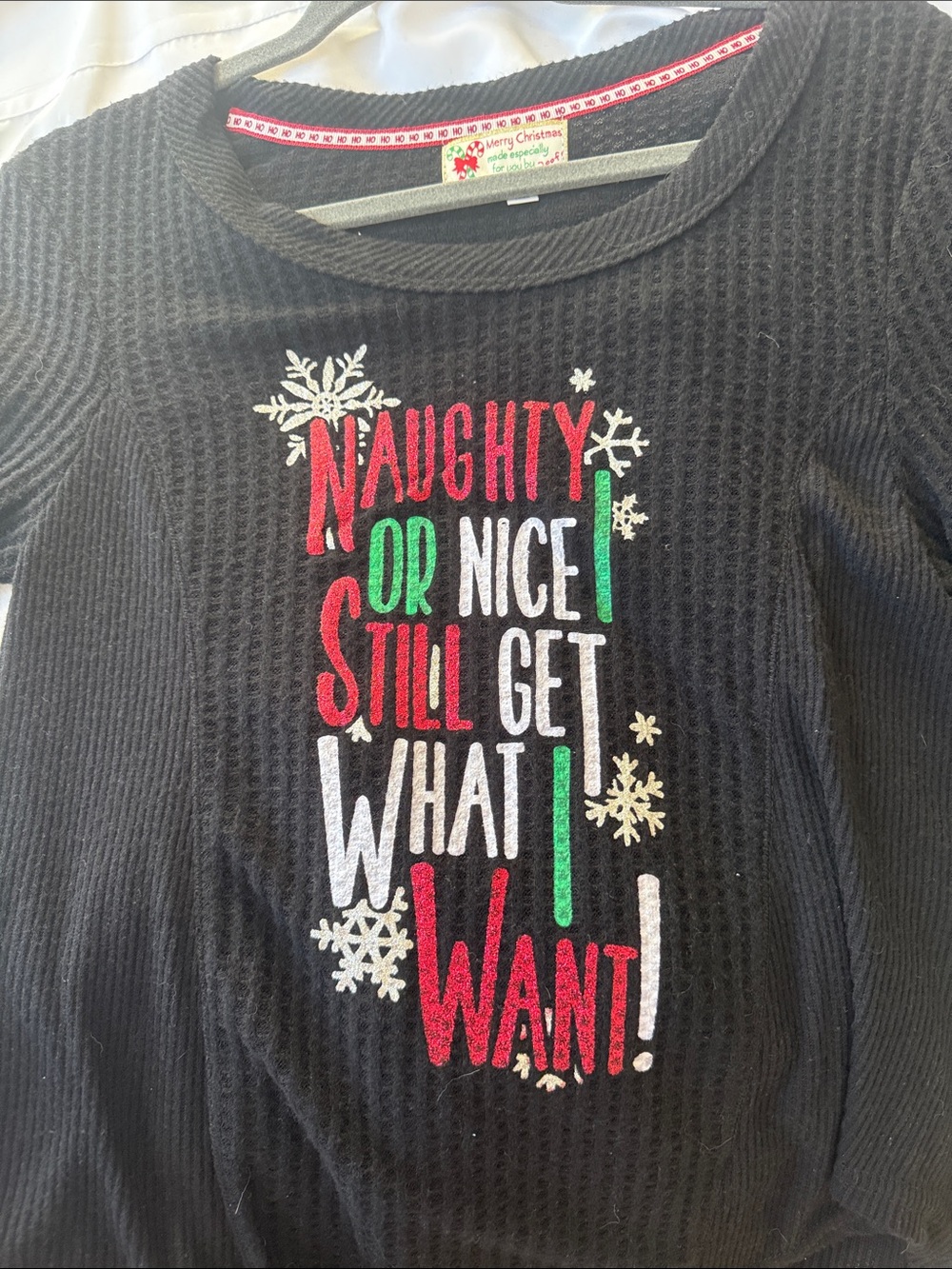 Poof! Black Long-Sleeve Holiday Graphic Tee with Red, Green, and White Accents